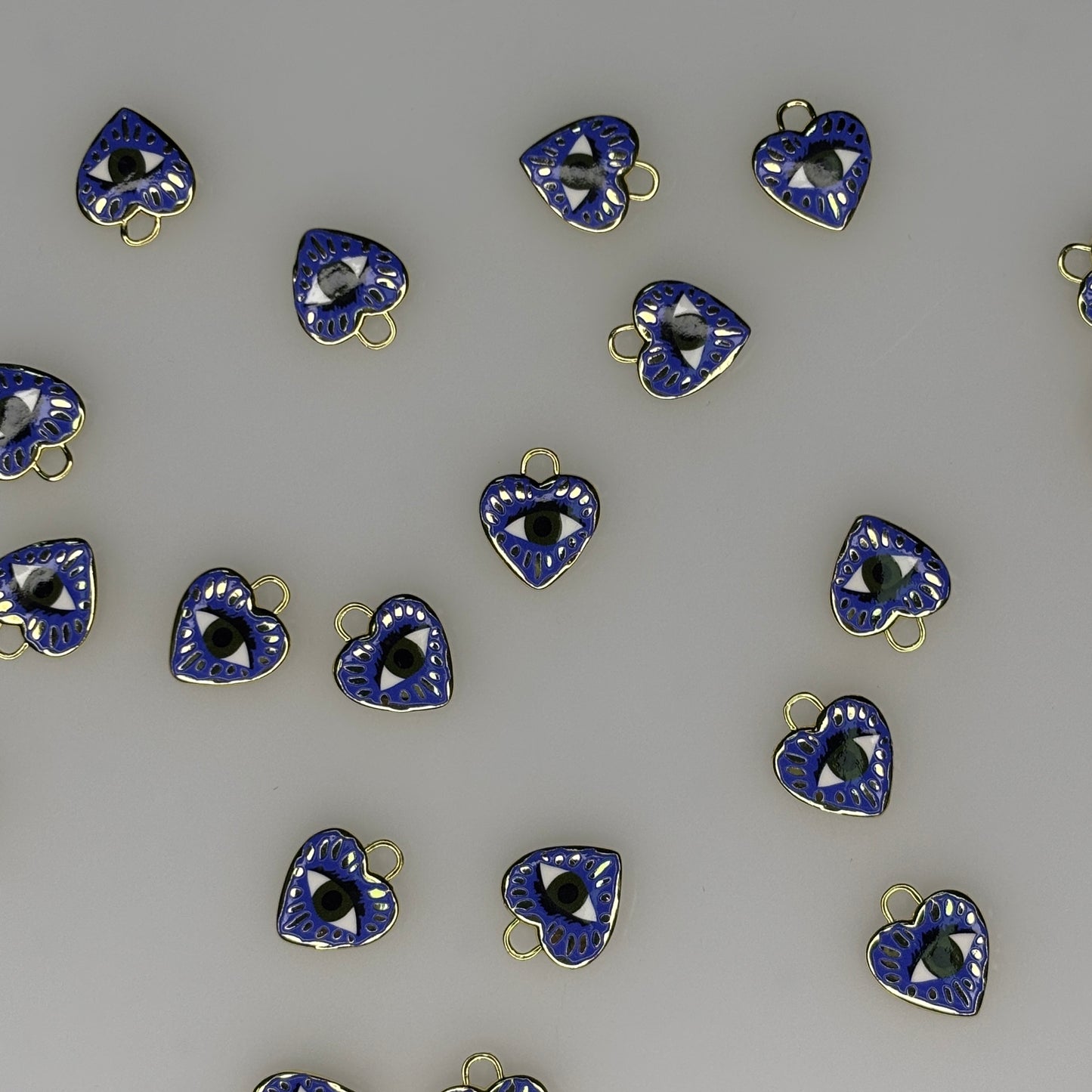 BLUE EVIL EYE HEART CHARM PENDANT