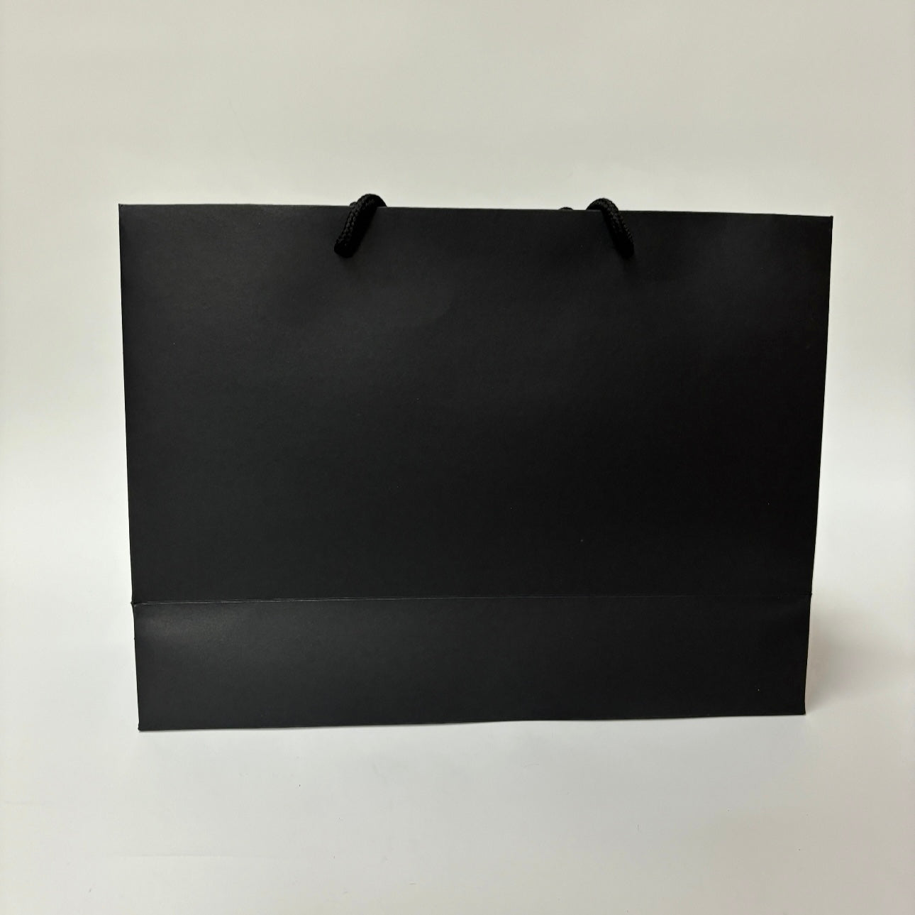 PERSONALISED BLACK & WHITE GIFT BAG WITH CAMELLIA FLOWER