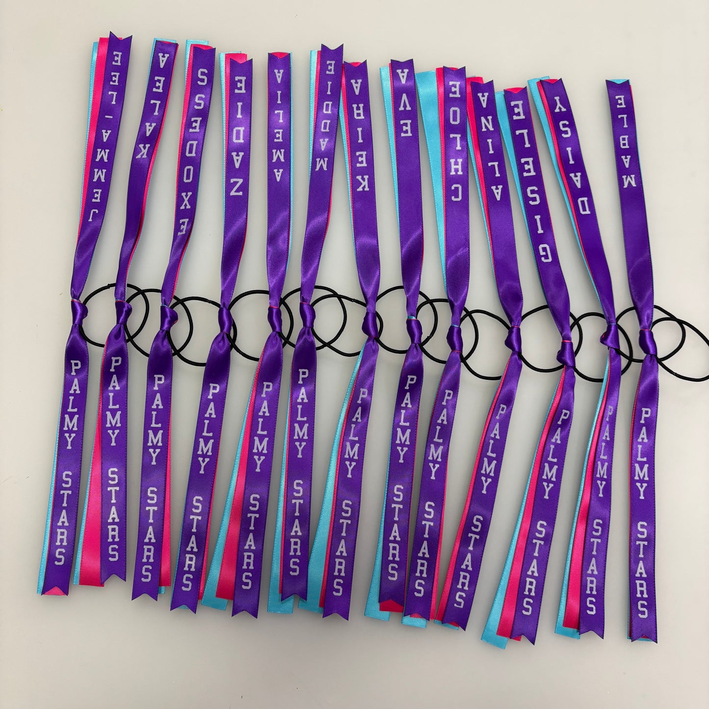 TEAM HAIR RIBBONS 3 COLOURS 15MM VERTICAL COLLEGE FONT