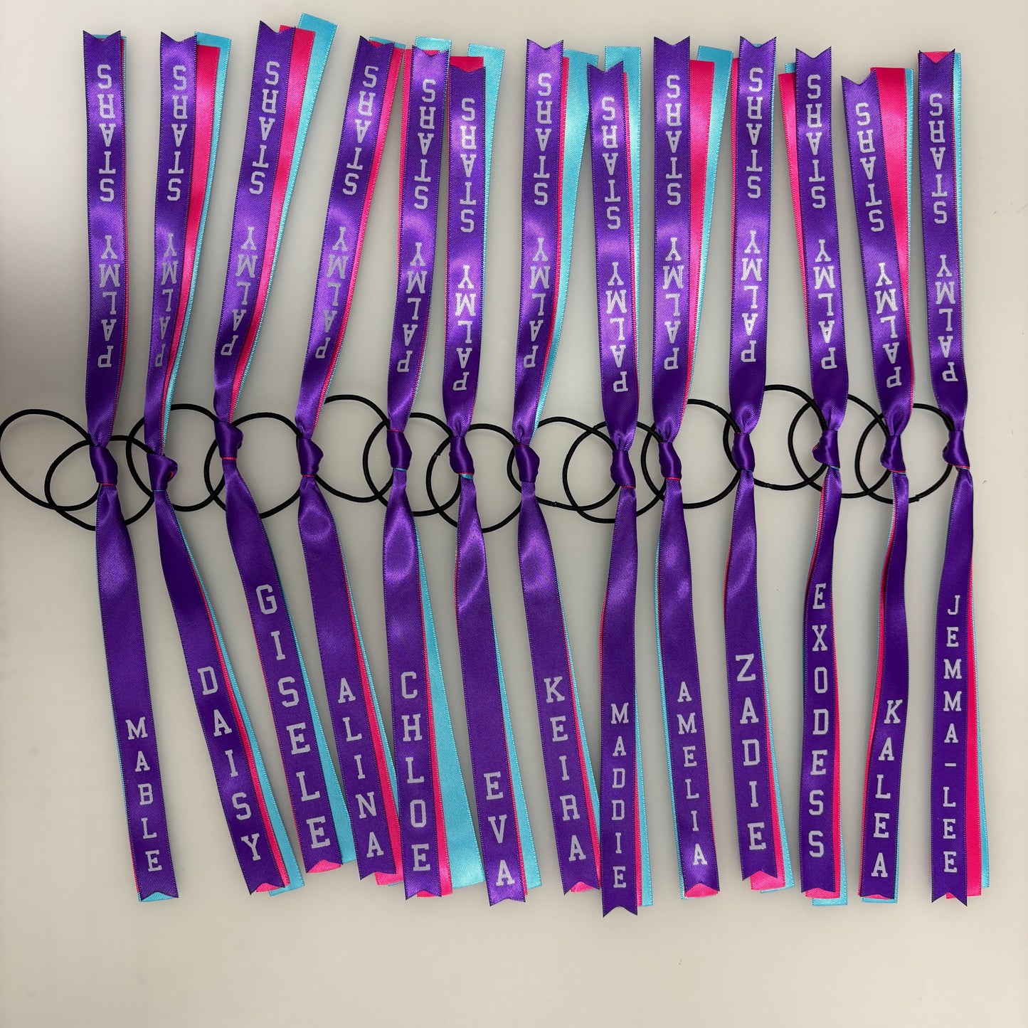 TEAM HAIR RIBBONS 3 COLOURS 15MM VERTICAL COLLEGE FONT