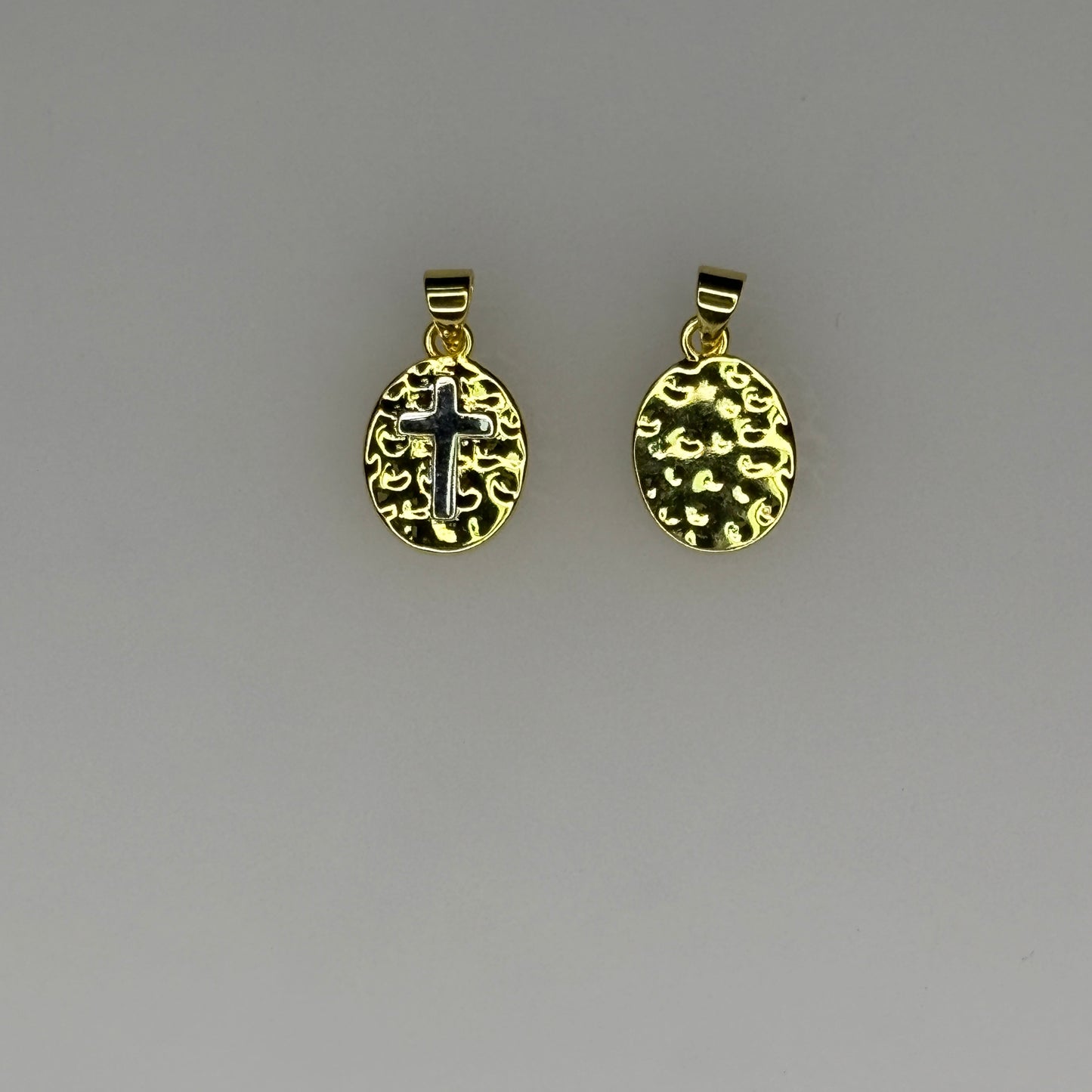 GOLD OVAL PENDANT WITH SILVER CROSS