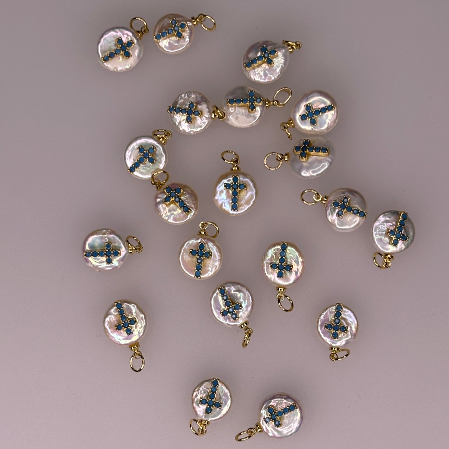 PEARL CHARM WITH BLUE STONE GOLD CROSS