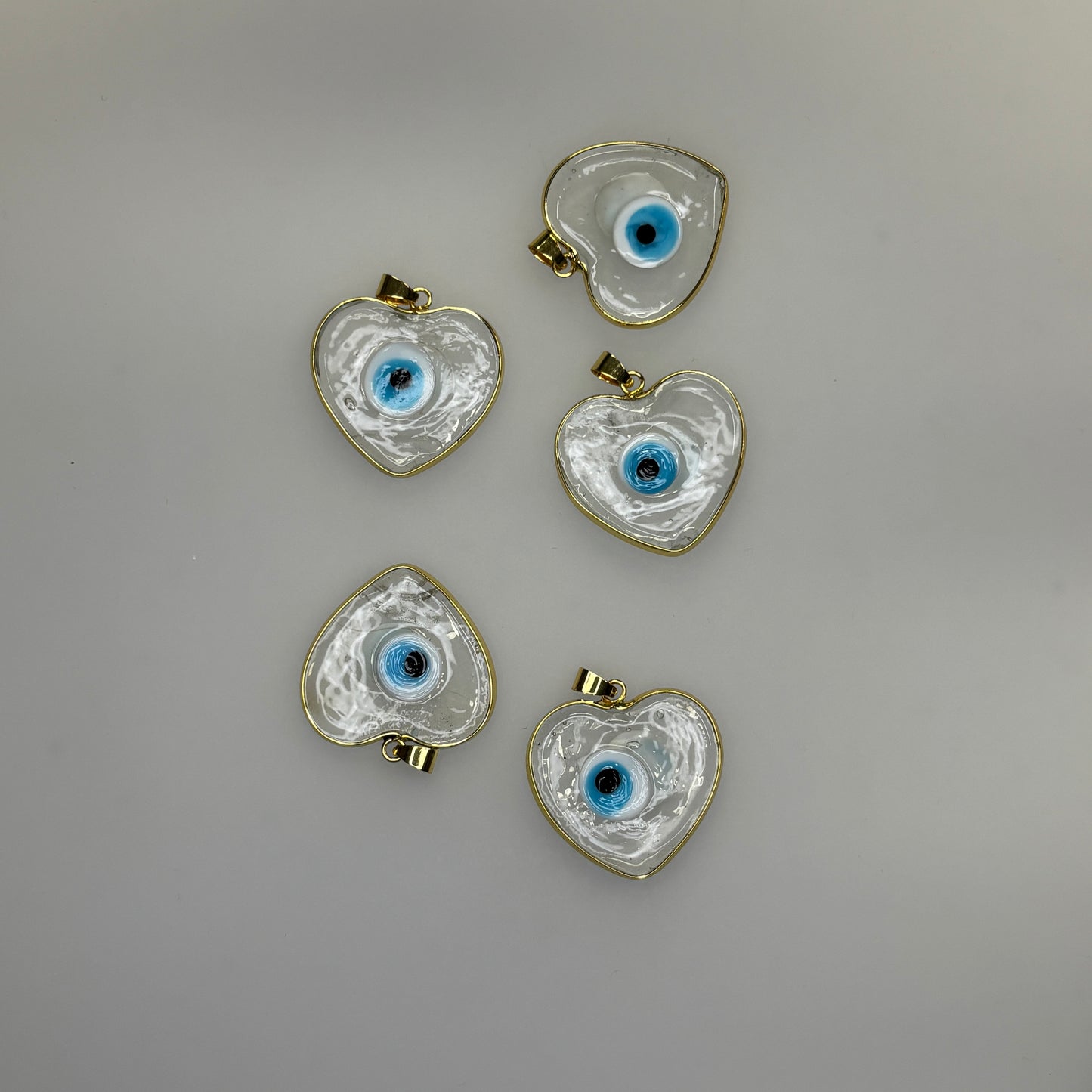 GLASS GOLD TRIM EVIL EYE HEART CLEAR CHARM PENDANT