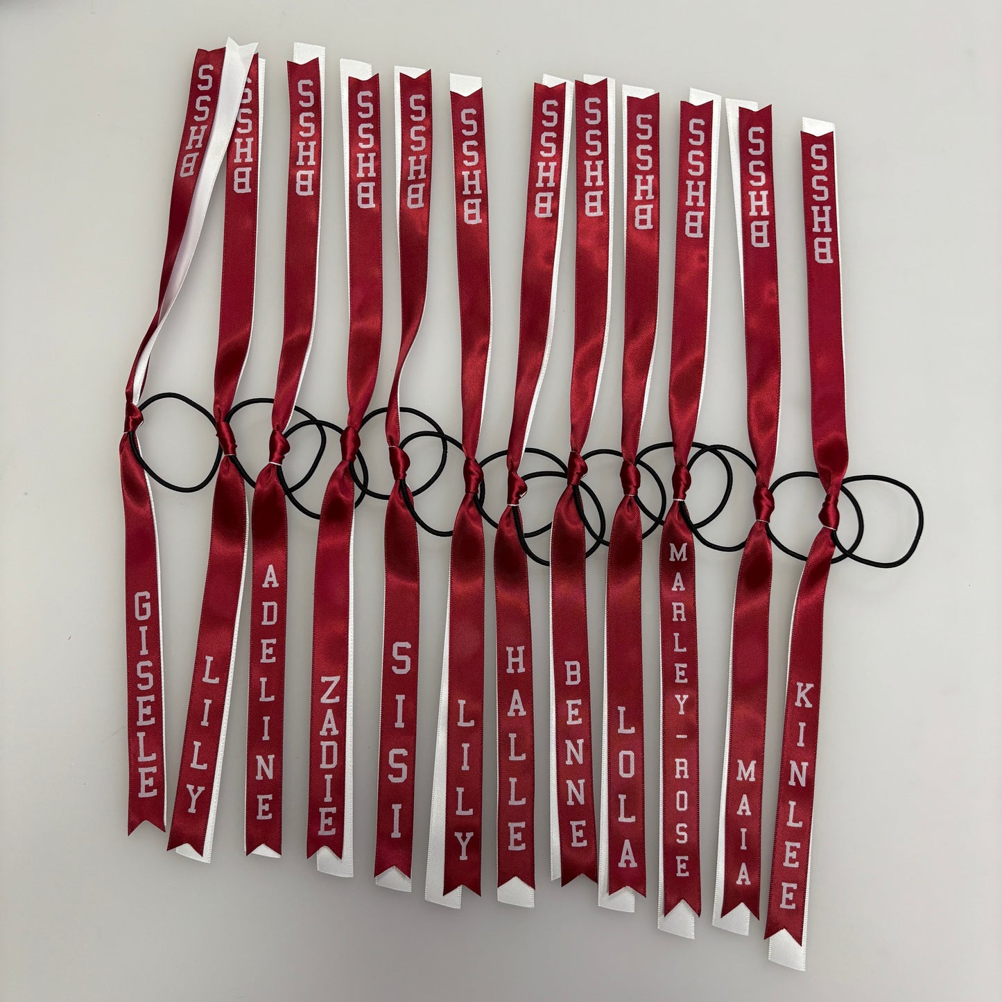 TEAM HAIR RIBBONS 2 COLOURS 15MM VERTICAL COLLEGE FONT