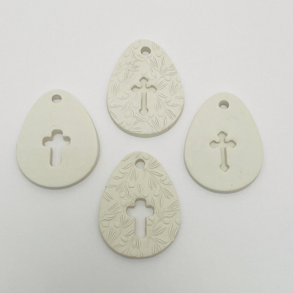 WHITE CLAY EGG WITH CUT OUT CROSS OR CROSS