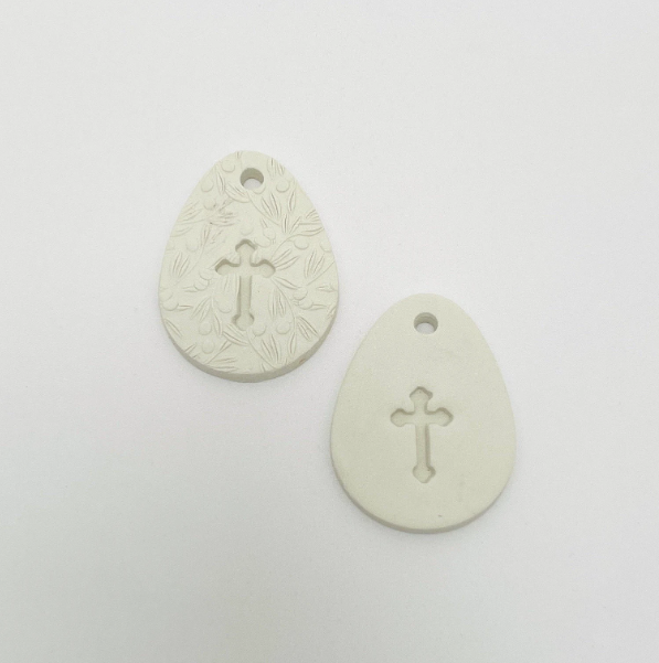 WHITE CLAY EGG WITH CUT OUT CROSS OR CROSS