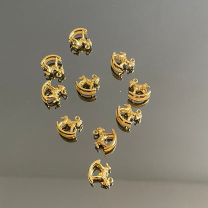 10 X GOLD ROCKING HORSE CHARMS