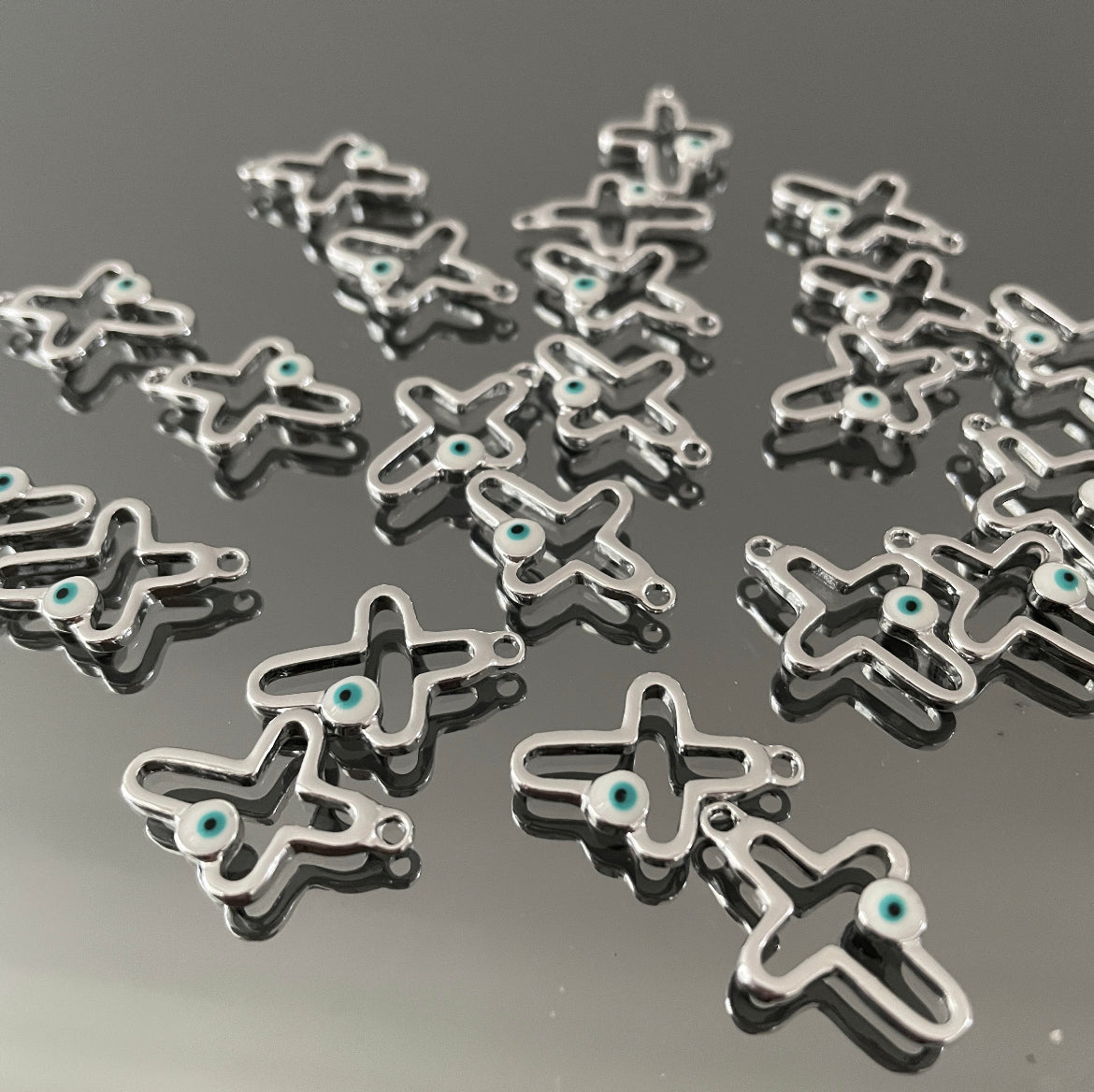 10 X SILVER EVIL EYE CROSS CHARM