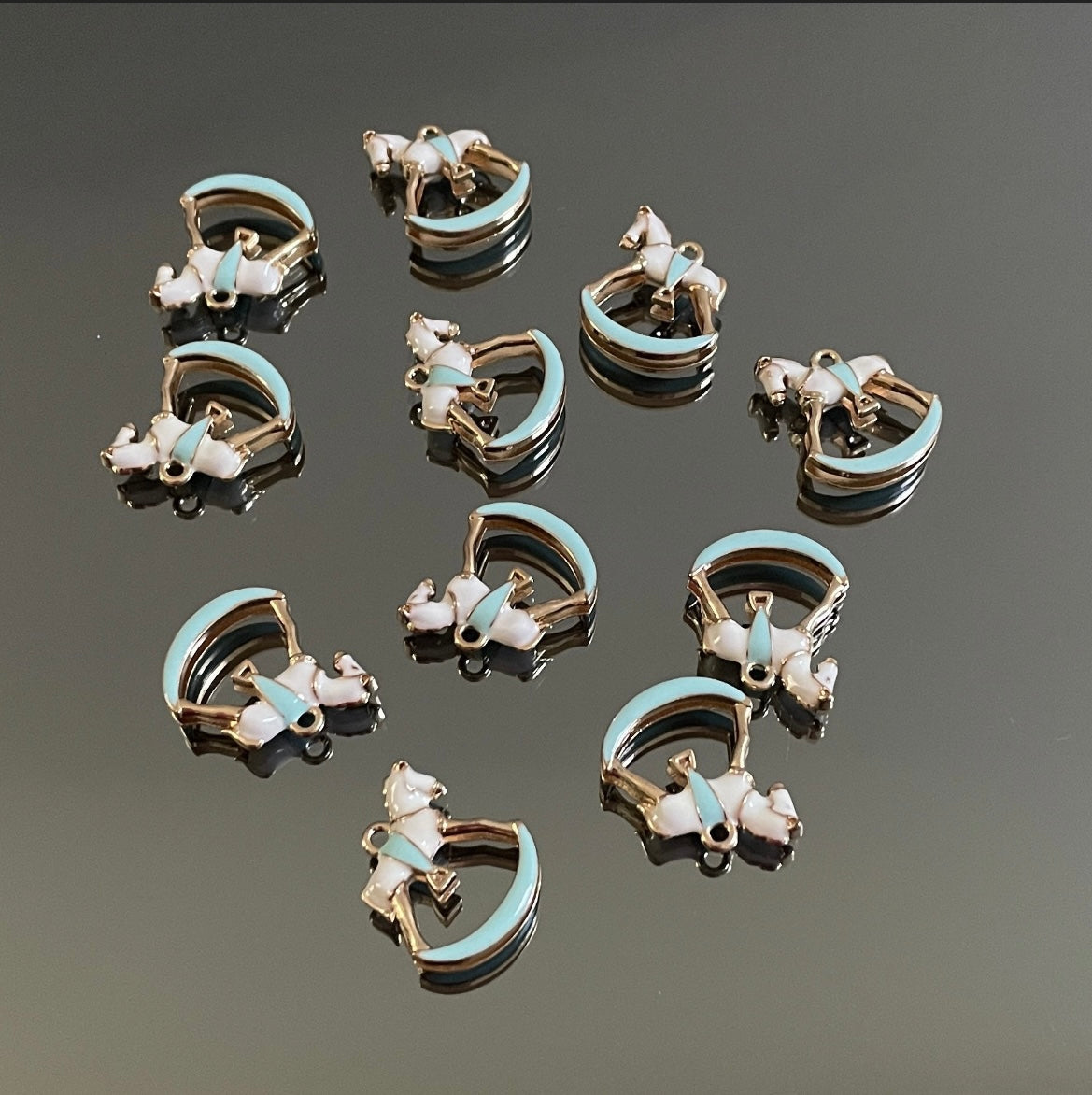 10 X BLUE METAL ROCKING HORSE CHARMS